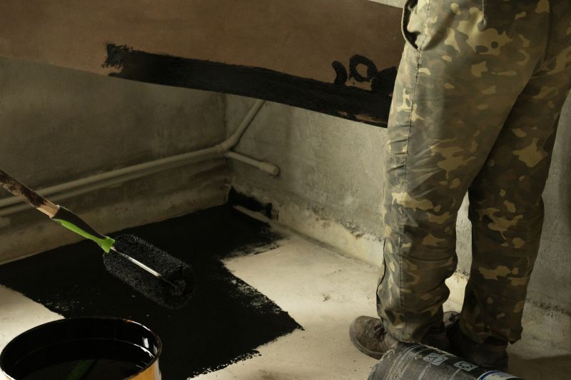 Waterproof coating application on basement walls